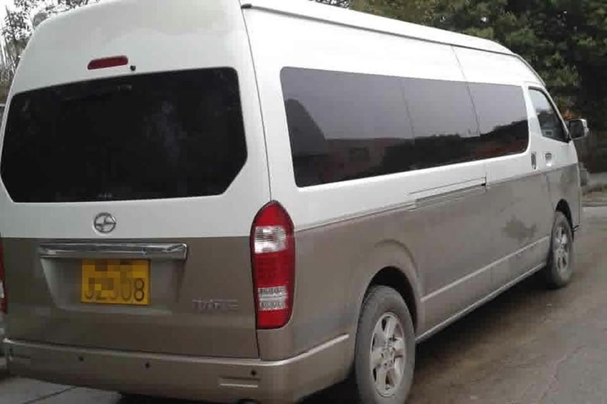 a white van parked on the side of a road