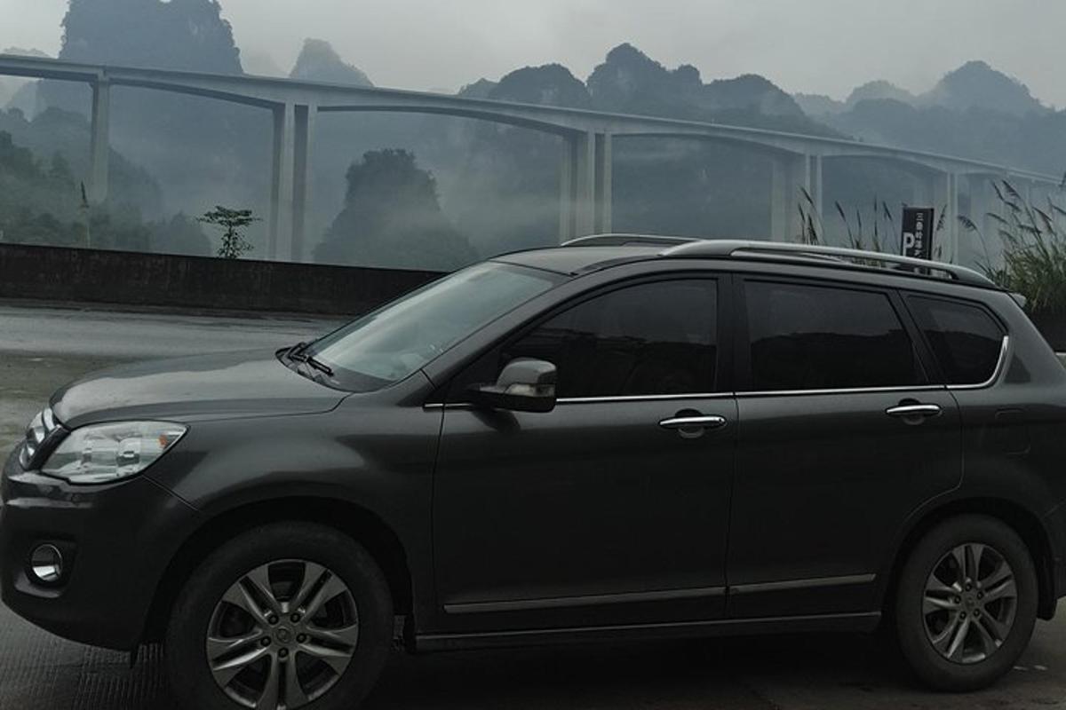 a black suv parked in a parking lot