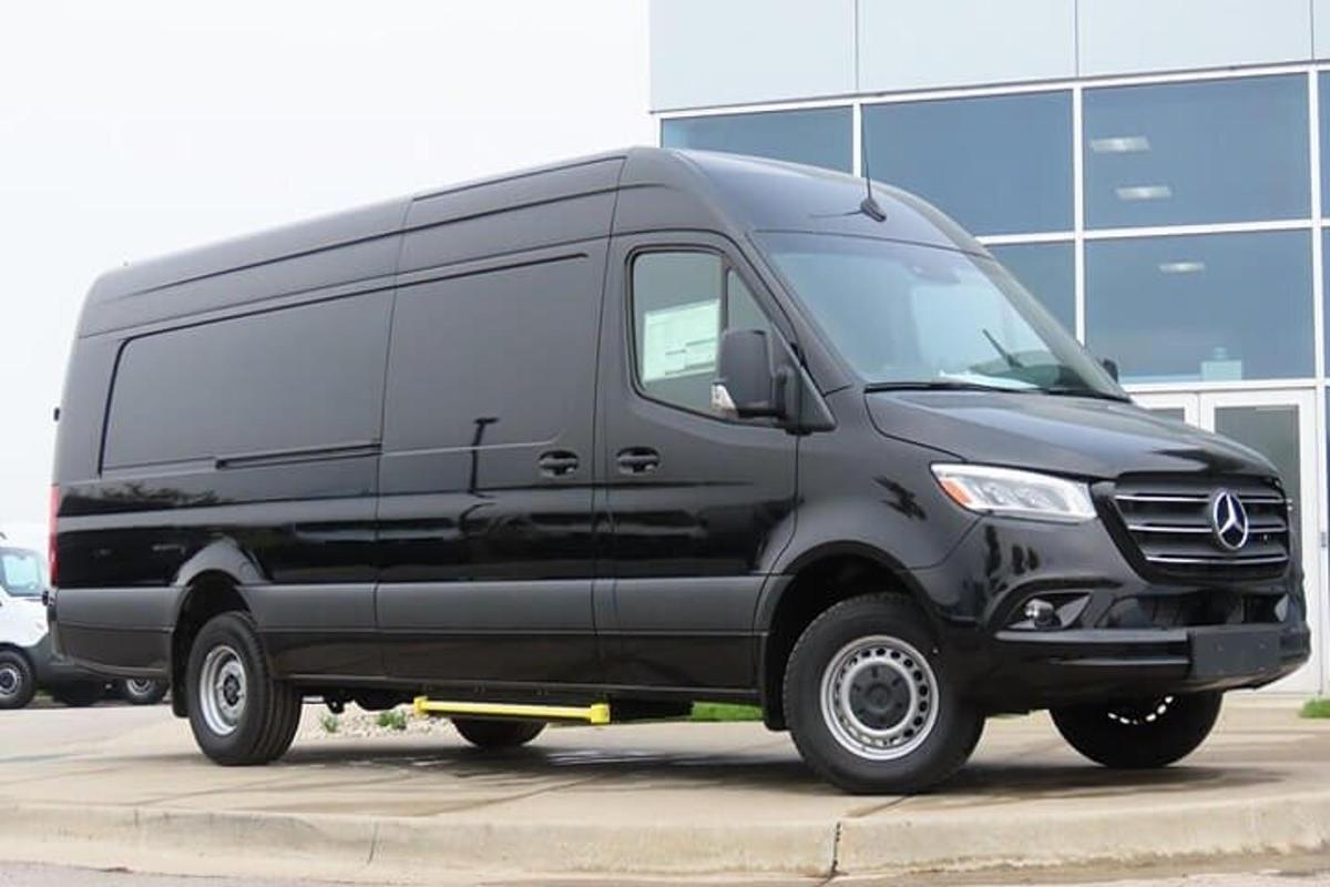 a black van parked in a parking lot