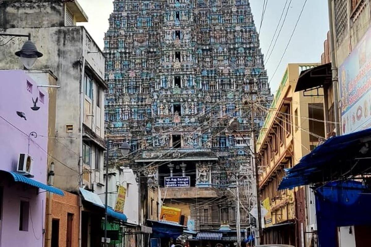 a tall building with a lot of graffiti on it