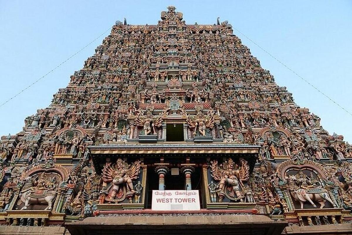 a tower of a temple with statues on it