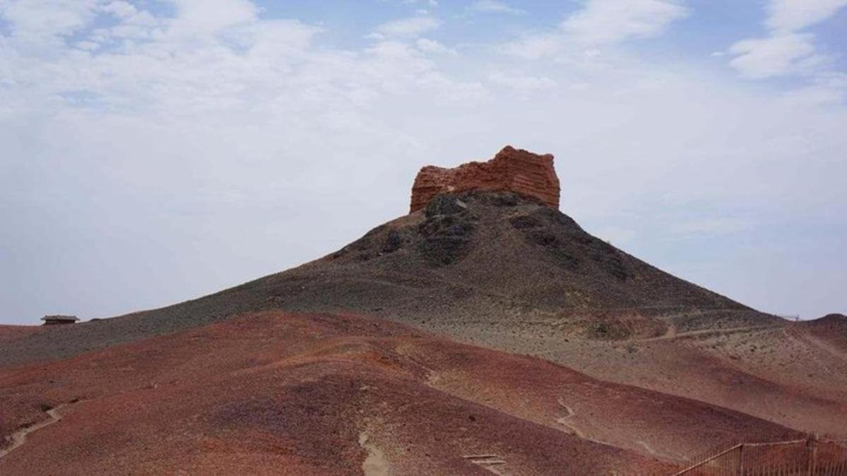 a rock formation on the top of a mountain