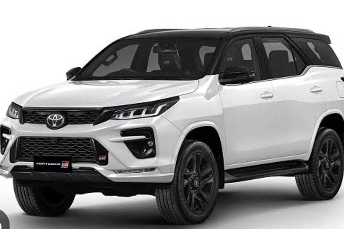 흰색 배경에 주차된 흰색 도요타 포춘러 SUV
