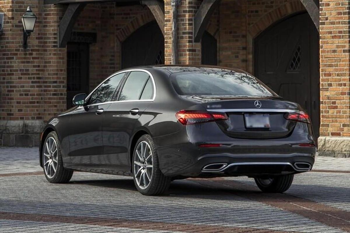 a black car parked in front of a building