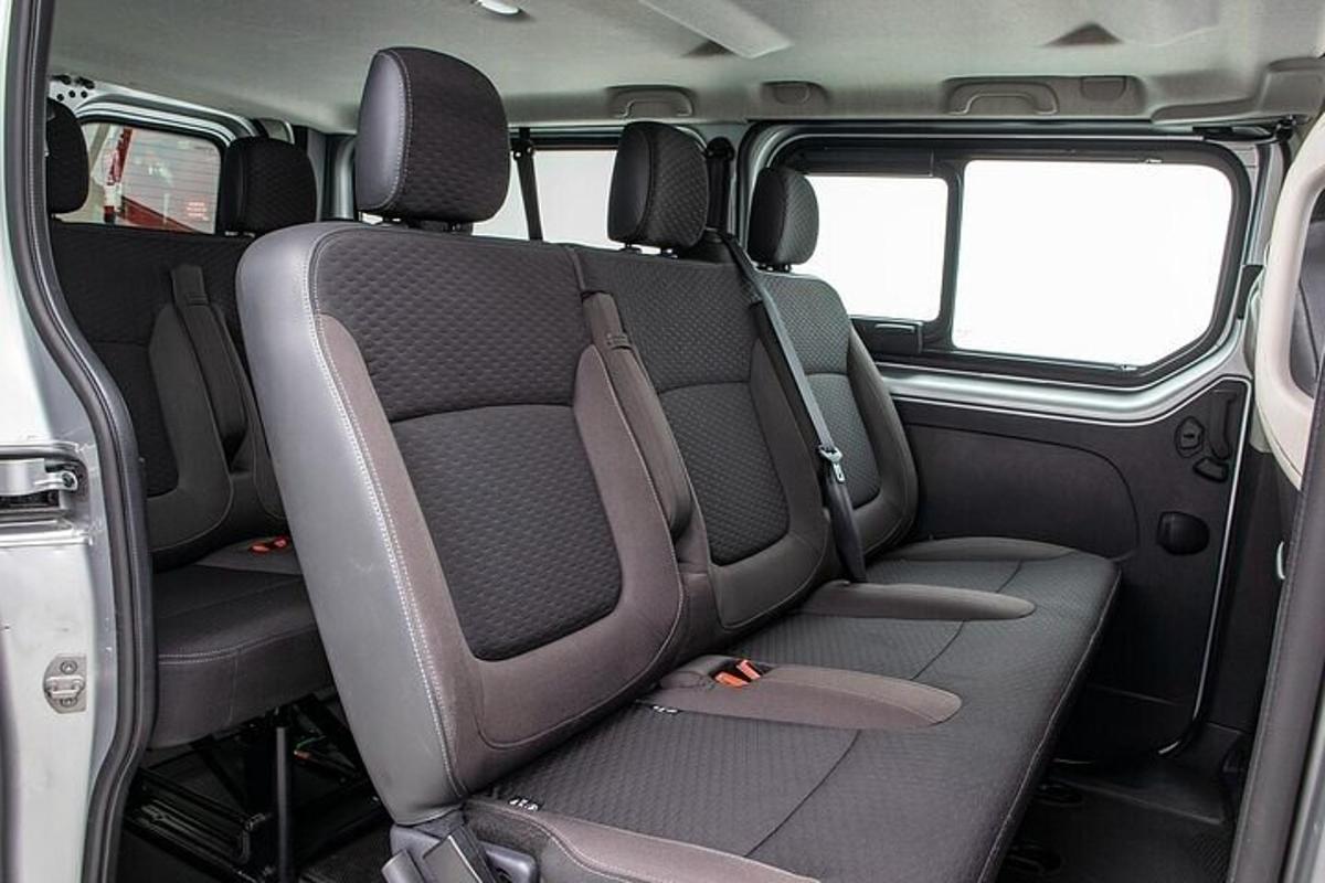 an empty seat in the back of a van