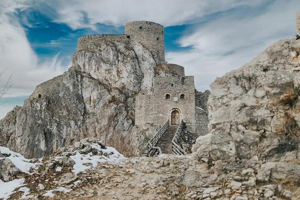 a castle on the side of a mountain
