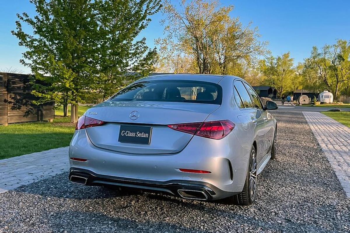 a silver car parked on the side of a road