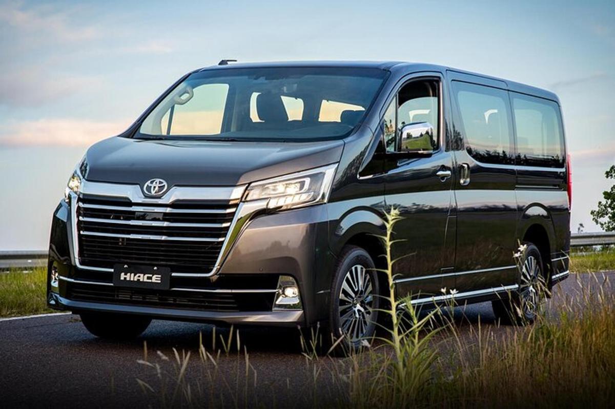 a black van parked on the side of a road