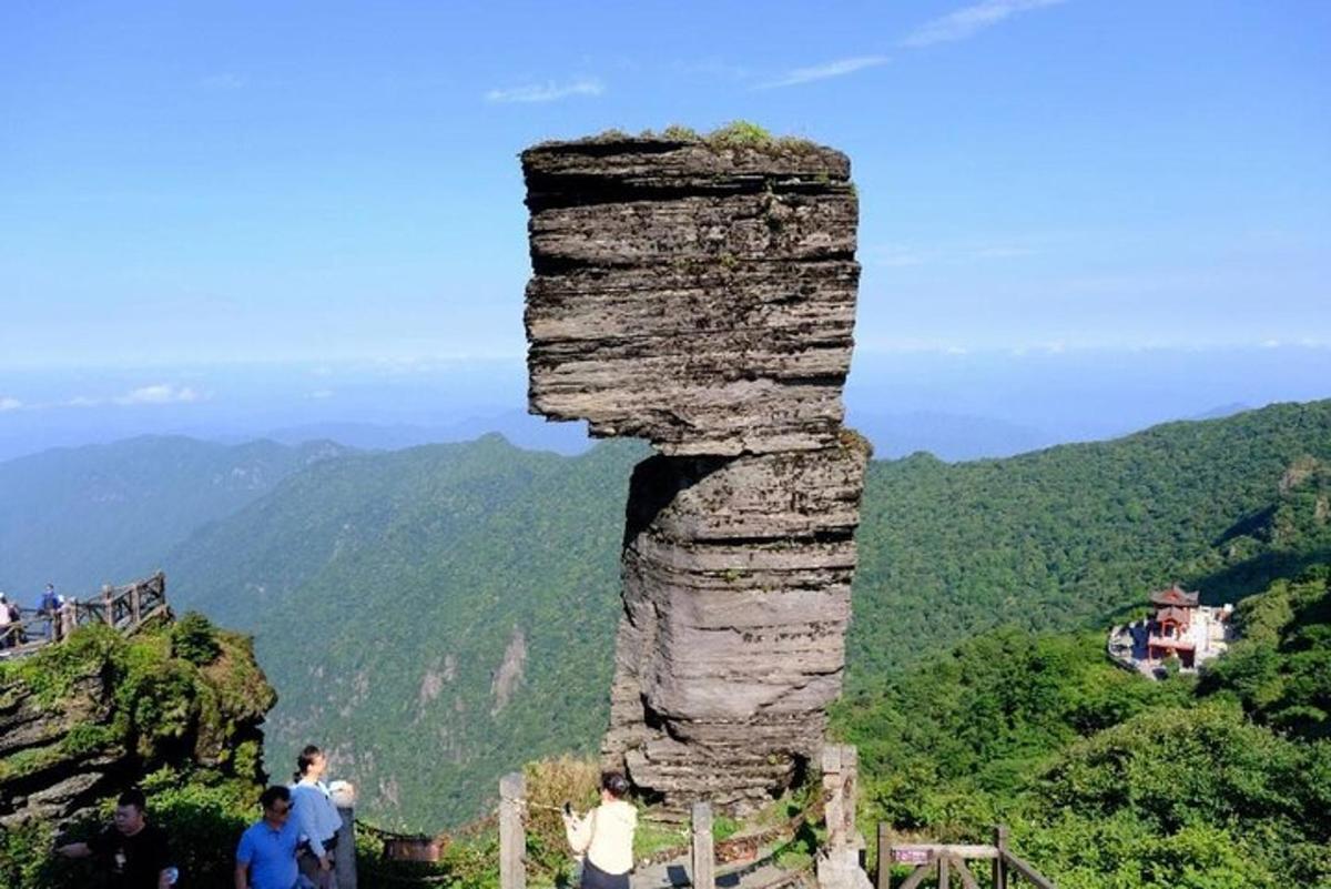 a rock sculpture on top of a mountain