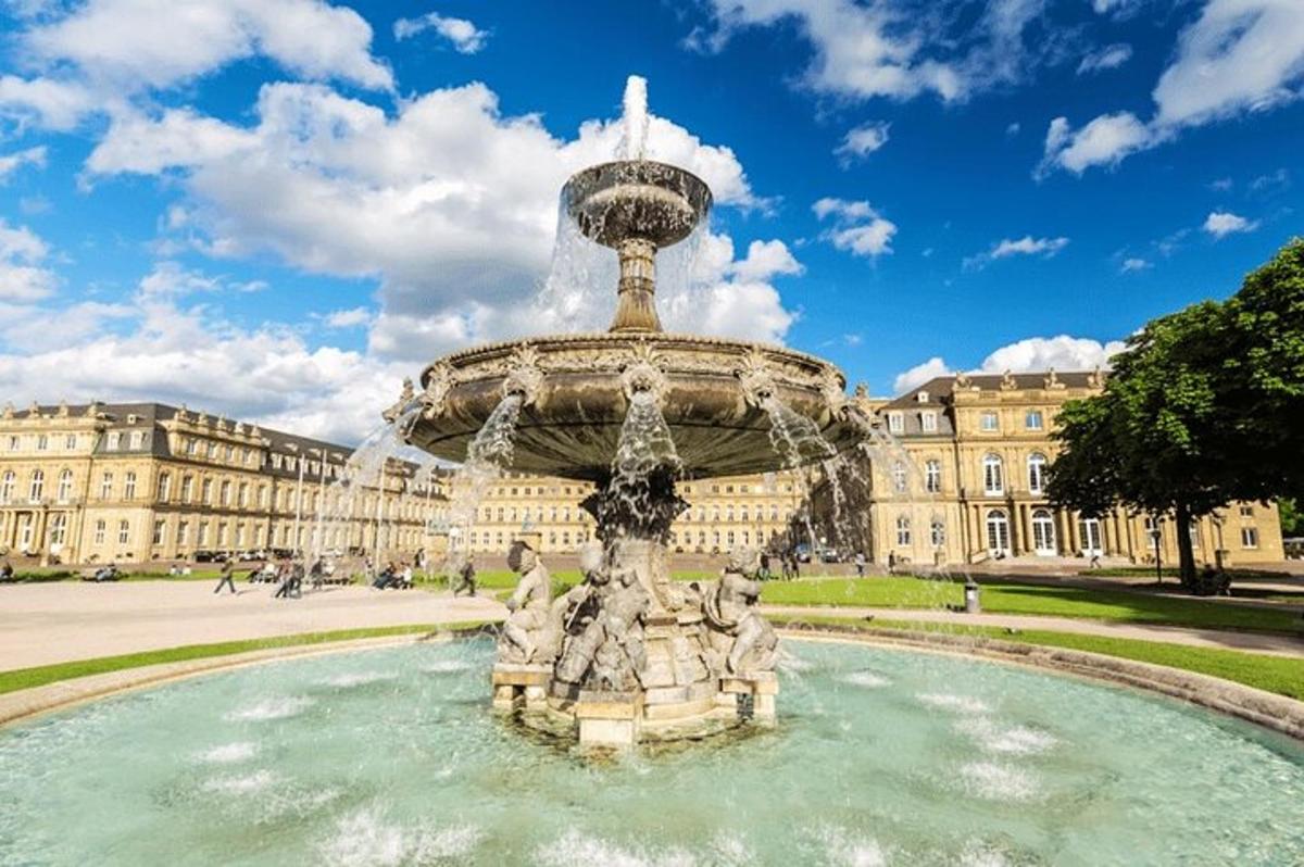 a fountain in front of a large building
