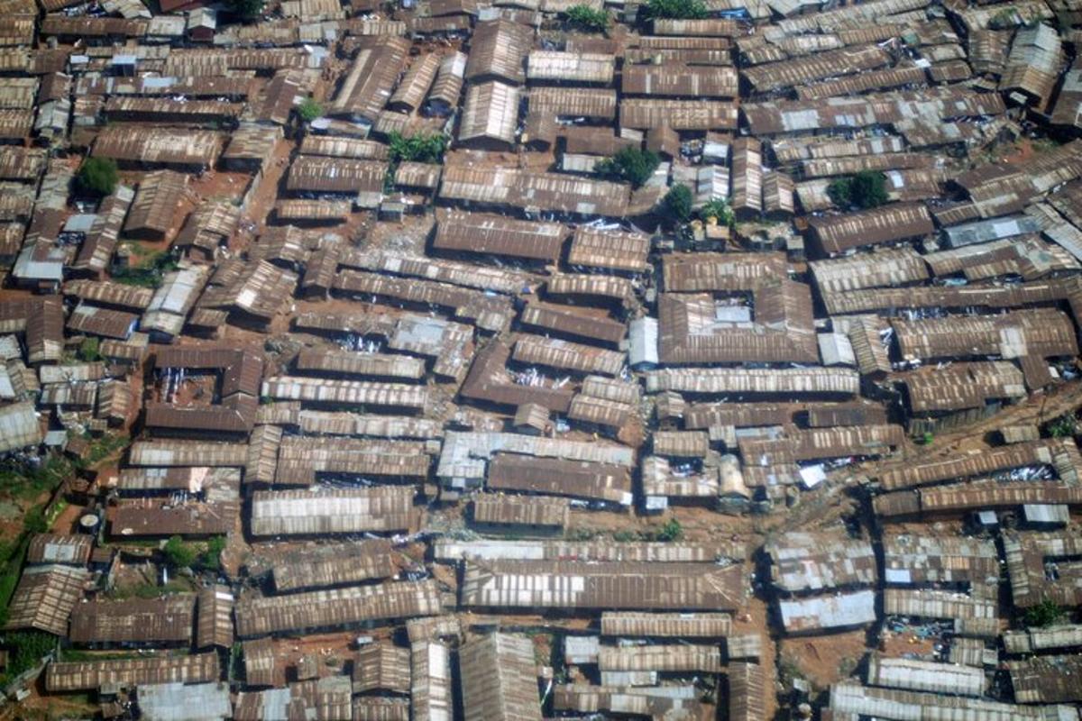 an overhead view of a city with many buildings