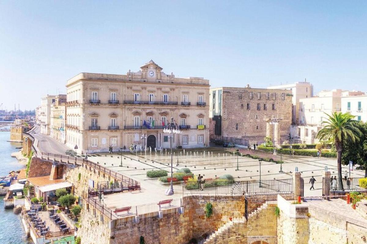 a large building next to a body of water