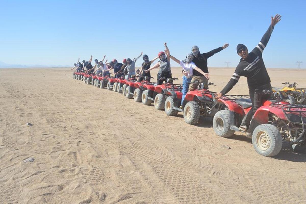 a group of people on atvs in the desert