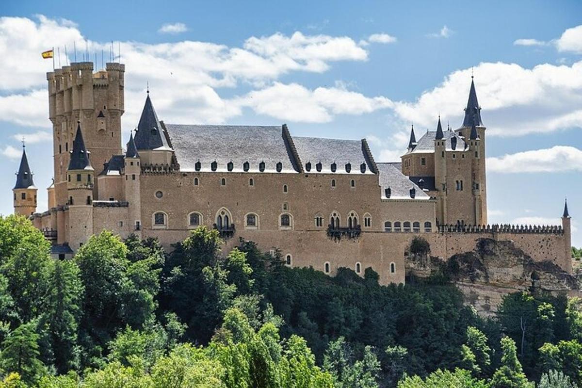 a large castle sitting on top of a hill