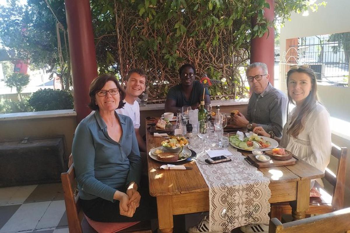a group of people sitting around a table