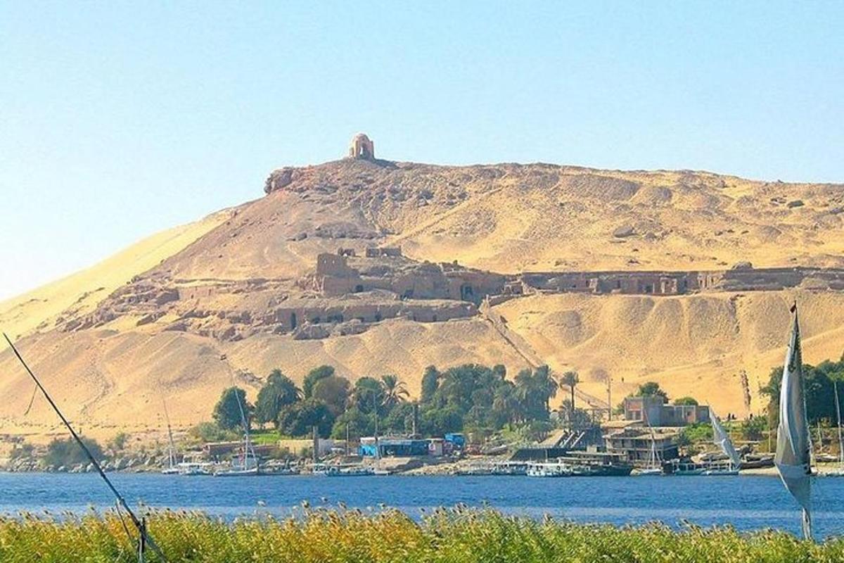 a view of a mountain with a body of water
