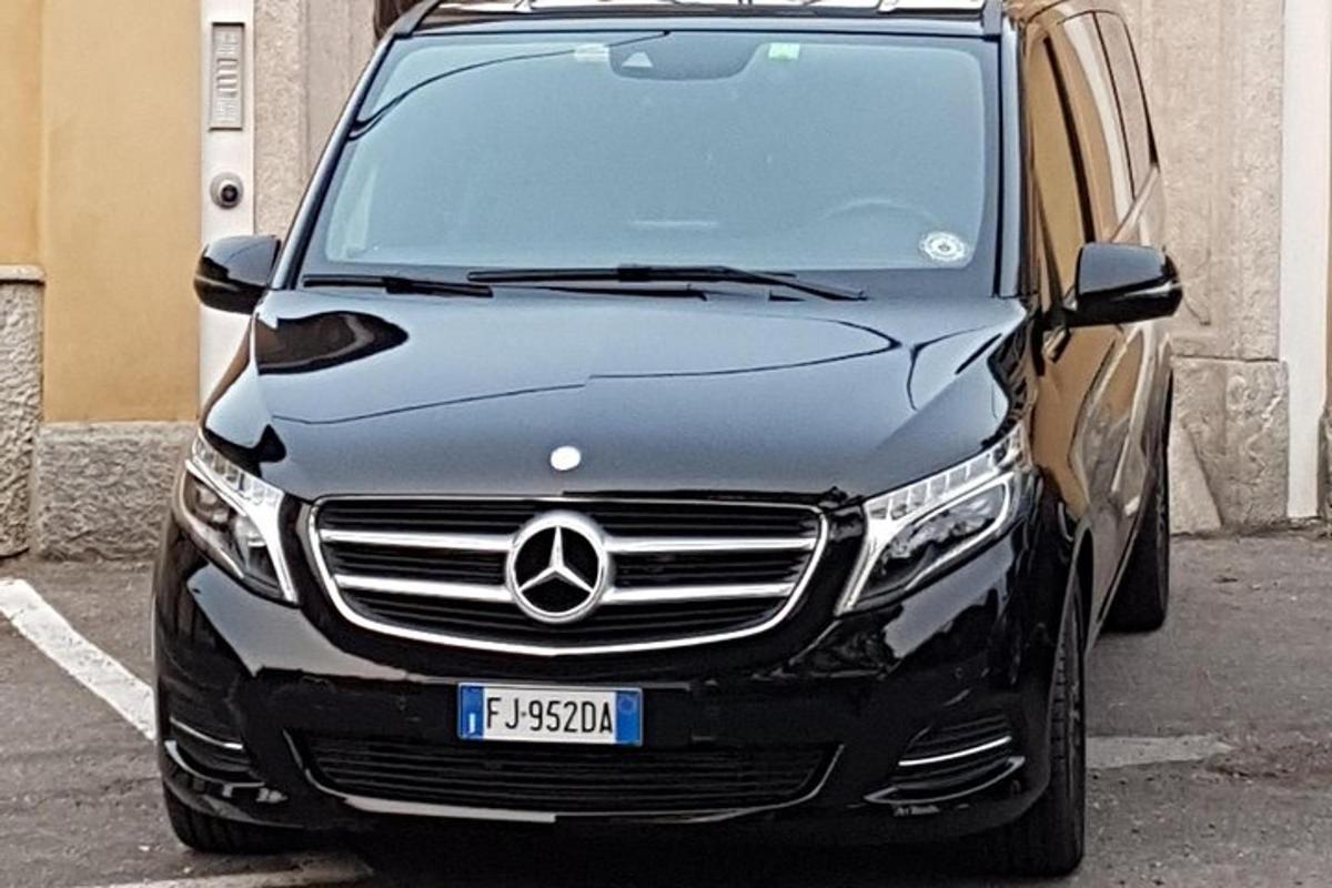 a black car parked in a parking lot
