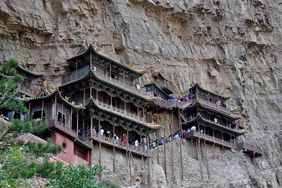 a building on the side of a mountain