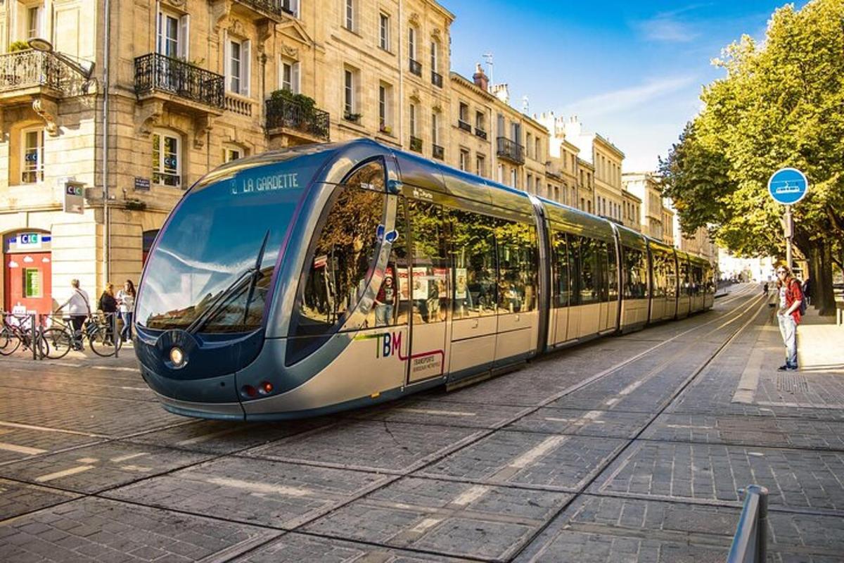 a train on a street in a city