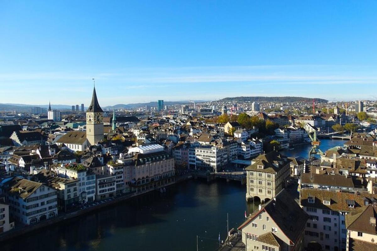 an aerial view of a city with a river
