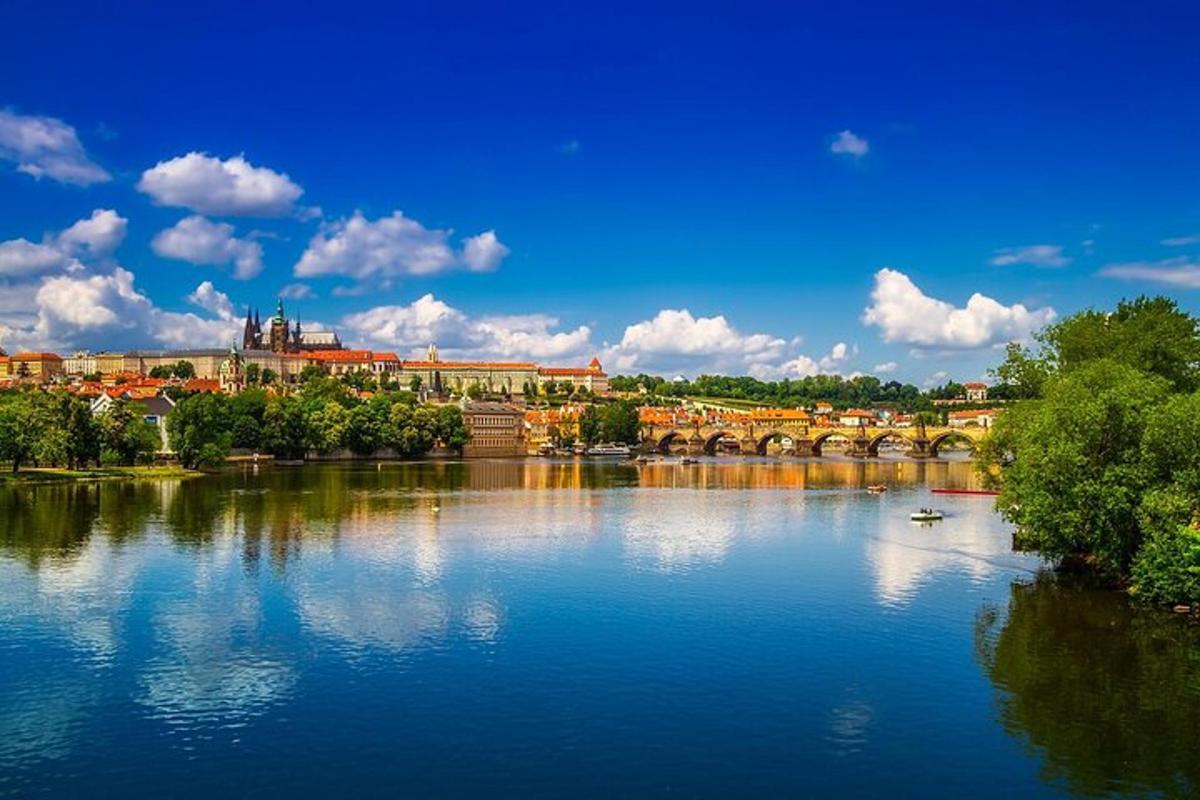 a view of a river with a city and a bridge