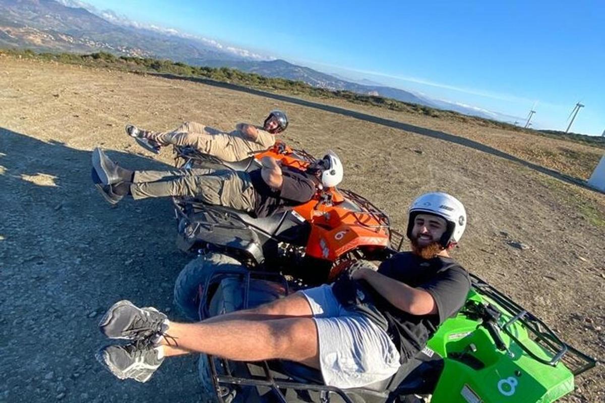 due uomini stanno guidando delle motociclette su una strada
