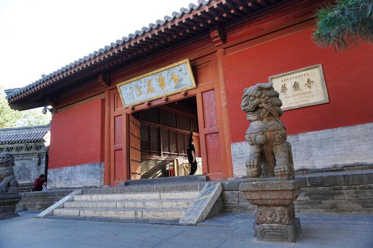 a building with a statue in front of it