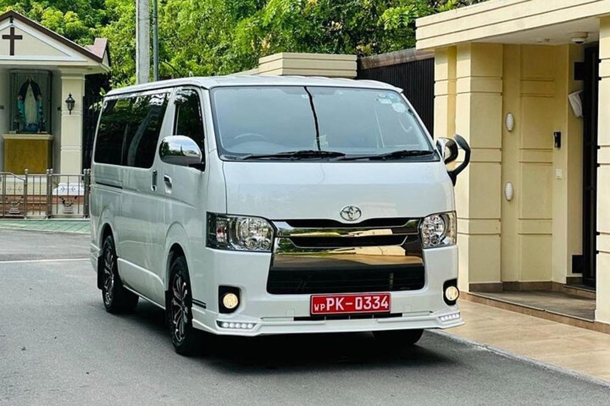 a white van parked in front of a house
