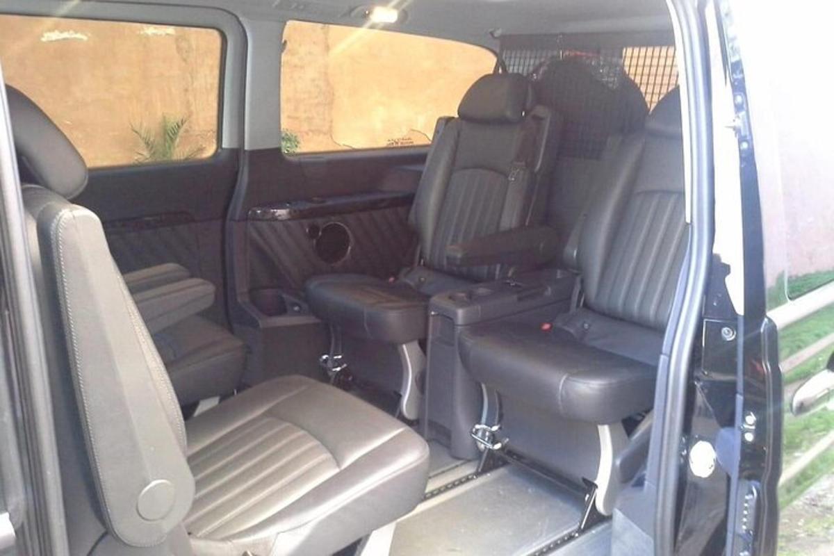 an open back seat of a minivan with the back seatsktop