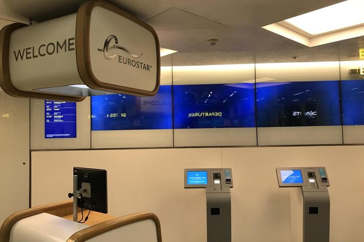 a waiting room with a welcome sign on the wall