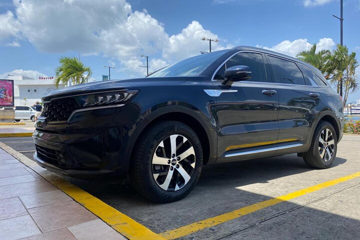 a black suv parked in a parking lot