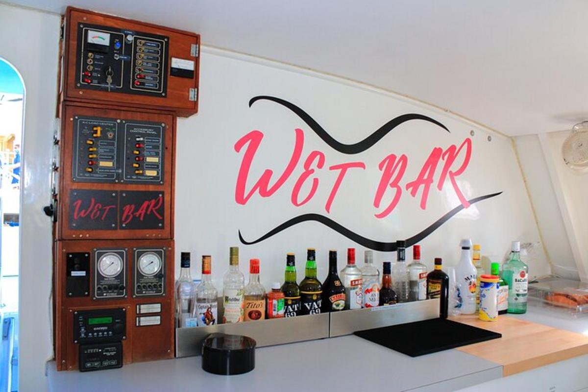 a bar with a wet bar sign on the wall