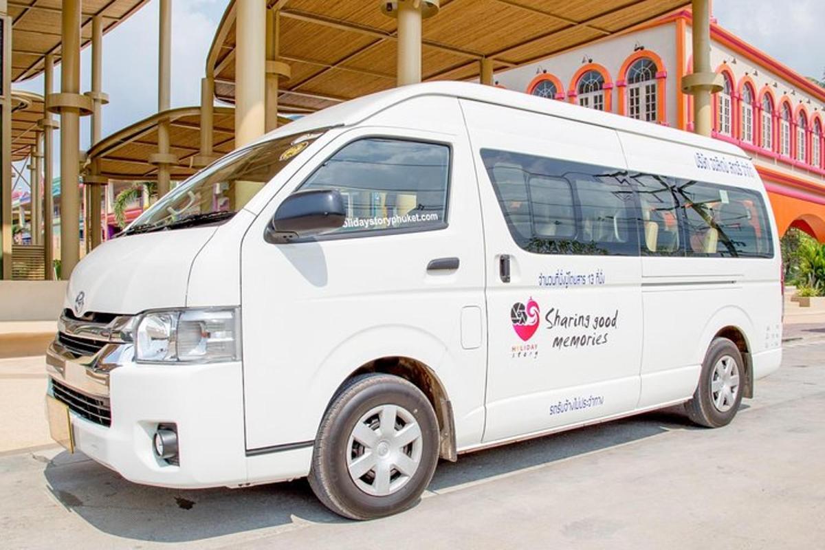 a white van parked in front of a building