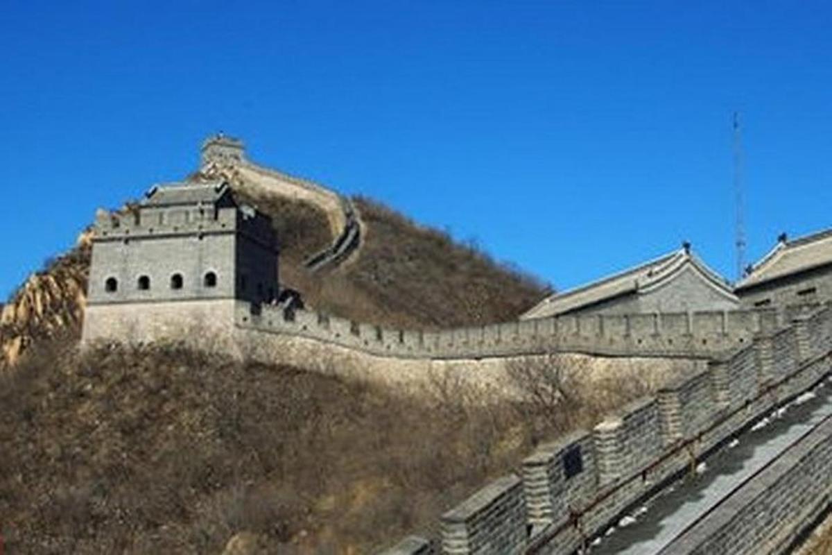a retaining wall of a castle on a hill