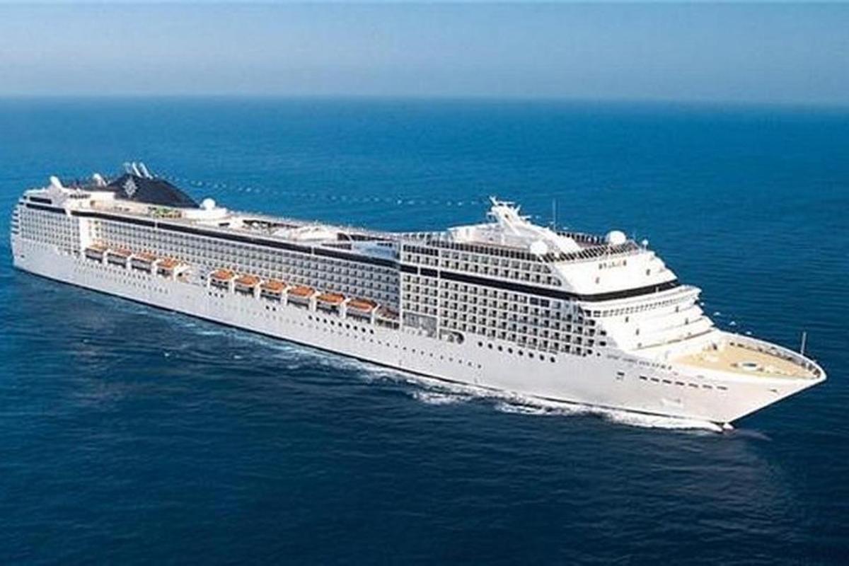 a cruise ship in the ocean on the water