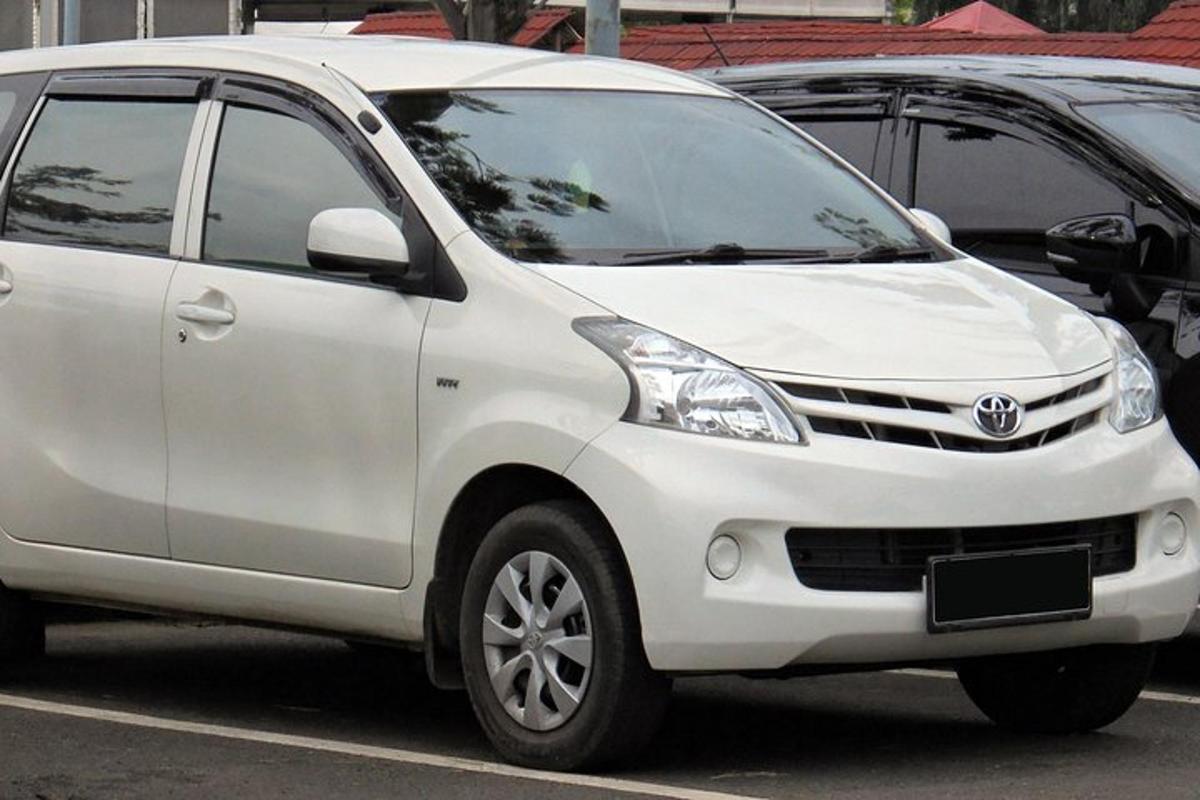 a white van parked in a parking lot