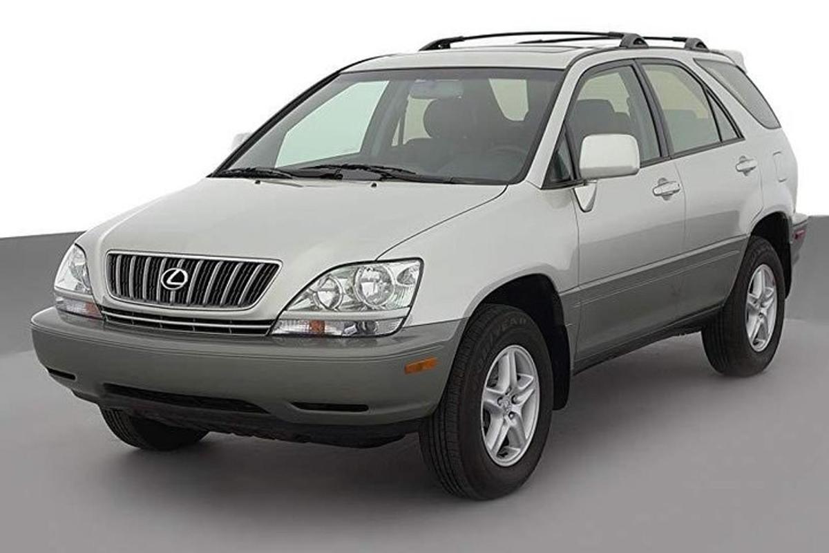 a white car is parked on a white background