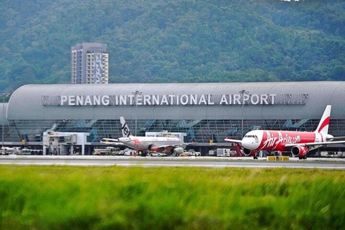 an airport with two airplanes on a runway