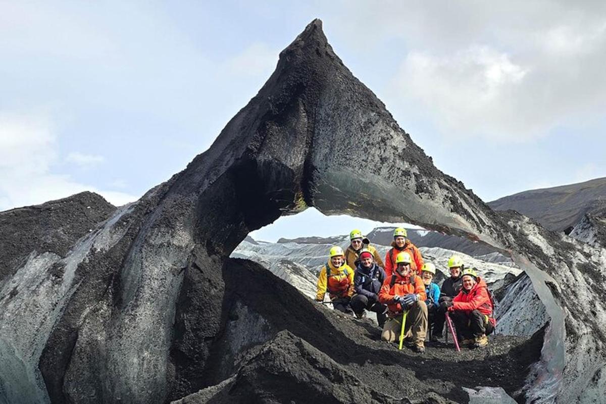 a group of people sitting on top of a mountain