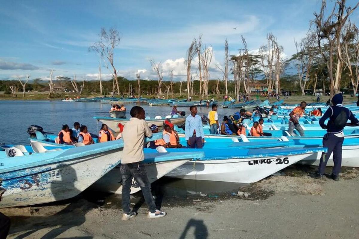 a group of people in boats on the water