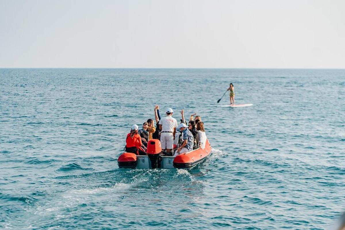 a group of people on a boat in the water