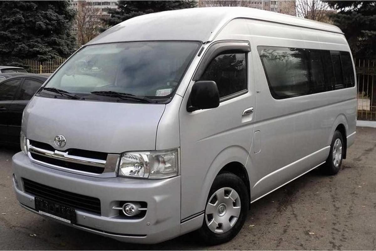 a white van parked in a parking lot