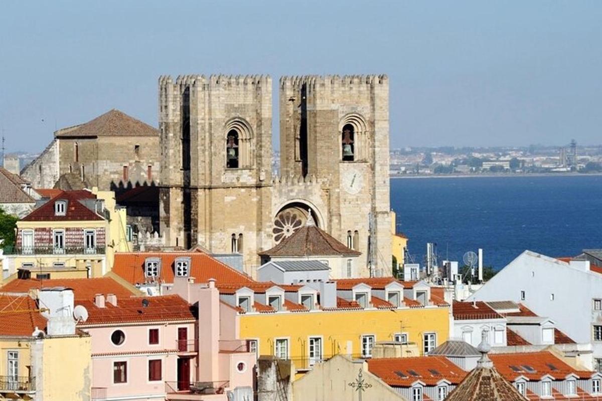 a view of a church and roofs of buildings
