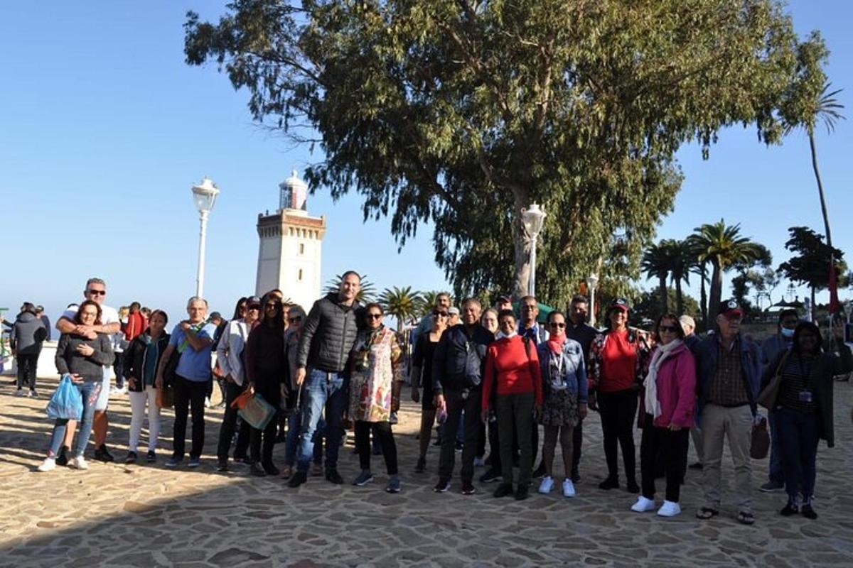 a group of people standing in front of a clock tower
