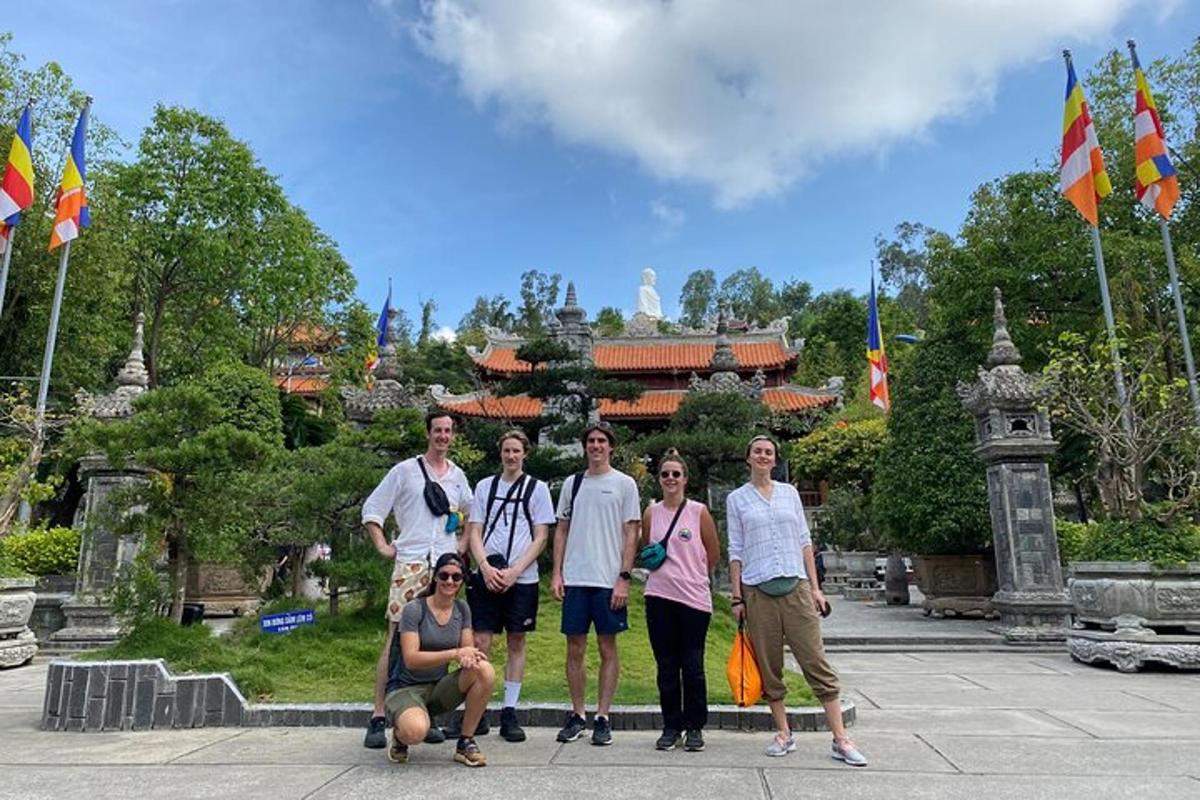 a group of people standing in front of a building