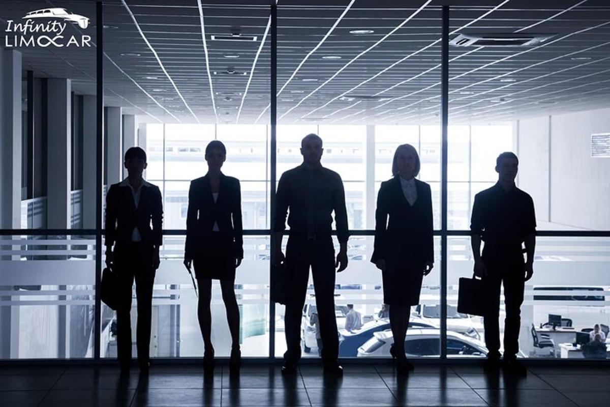 a group of people standing in front of a window