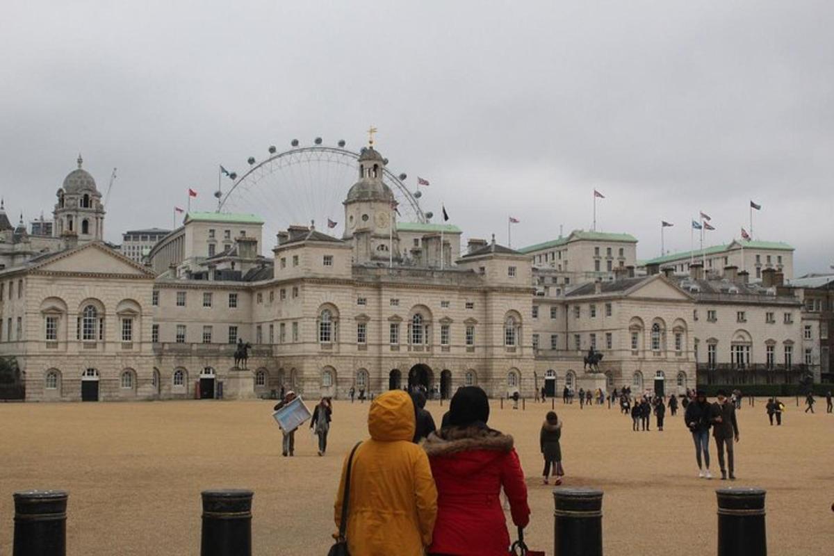 a group of people standing in front of a large building