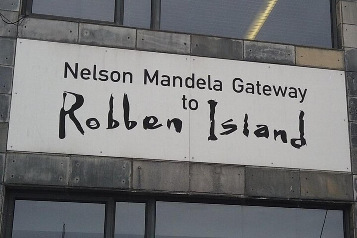 a sign for a melusalem mandela gateway to railroad island