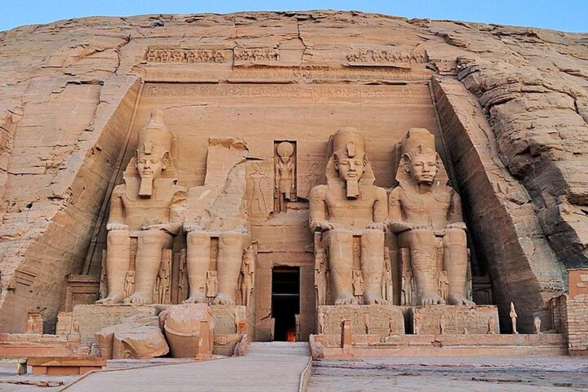 a large building with statues on the side