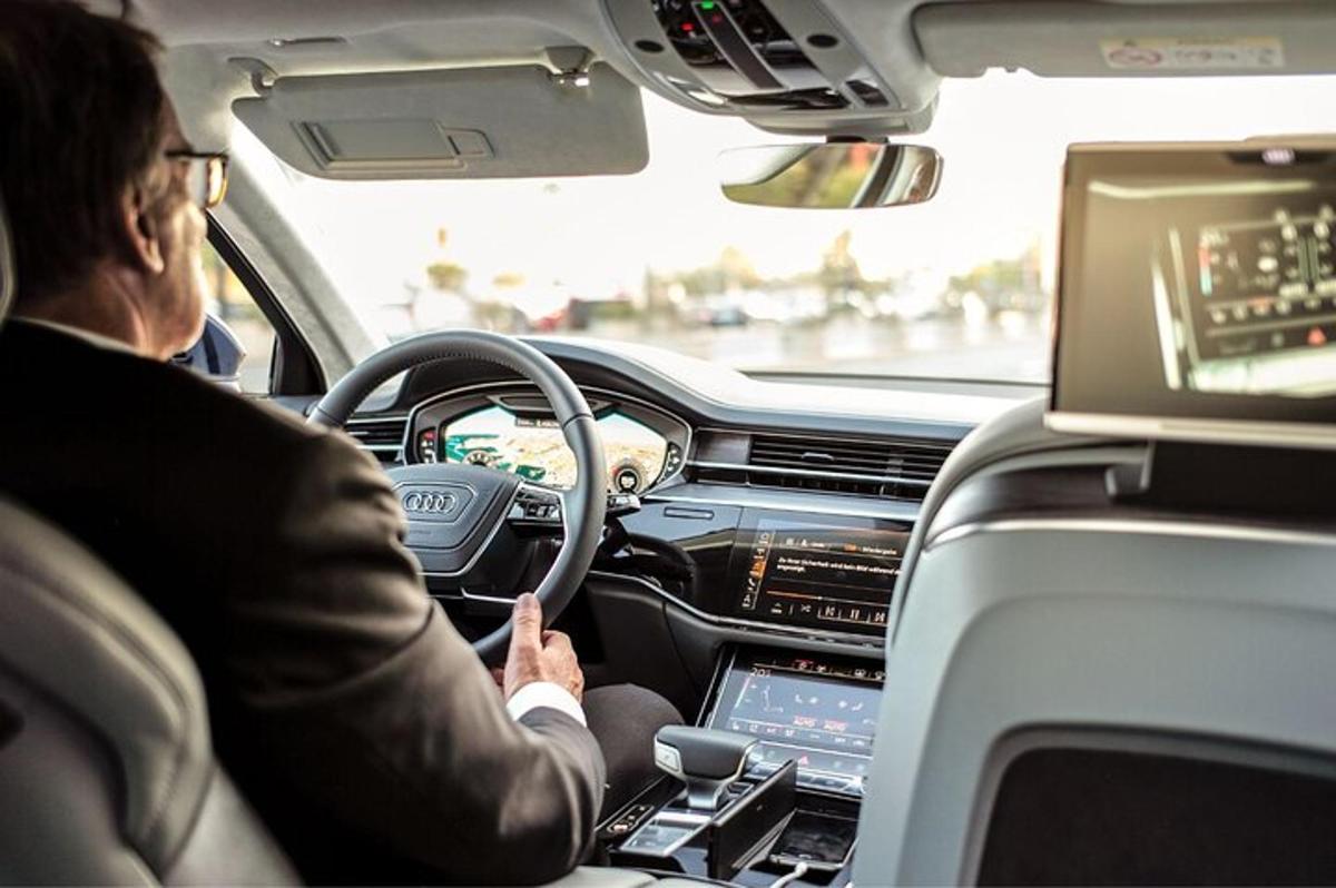 a man driving a car